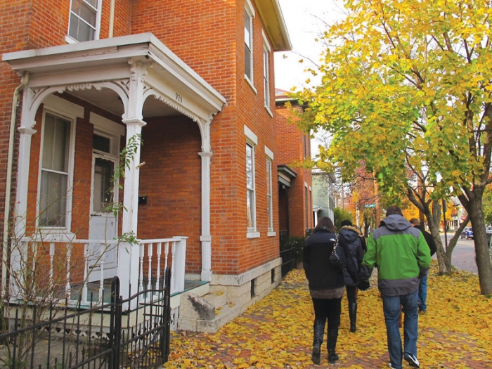 Columbus Food Adventures offers a walking tour, at left through German Village to learn the history of the area and sample foods at several top eating establishments. The privately restored neighborhood dates back to the mid-1800s and is on the National Register of Historic Places. (Pamela O’Meara/Review)
