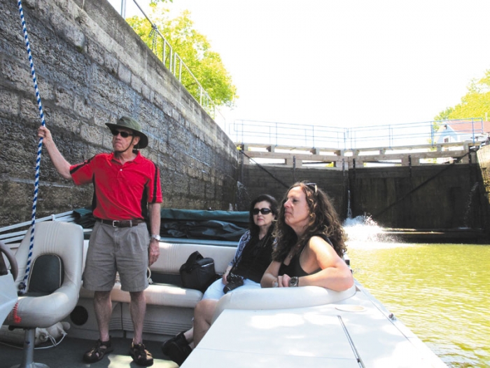 The recently restored locks system on the Fox River is one of two remaining hand-operated sets of locks in the nation. Visitors can take a narrated pontoon ride through them. (Pamela O’Meara/Review)